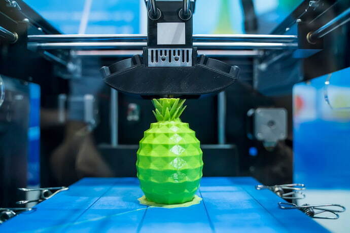 Impressora 3D desenvolvendo um abacaxi 