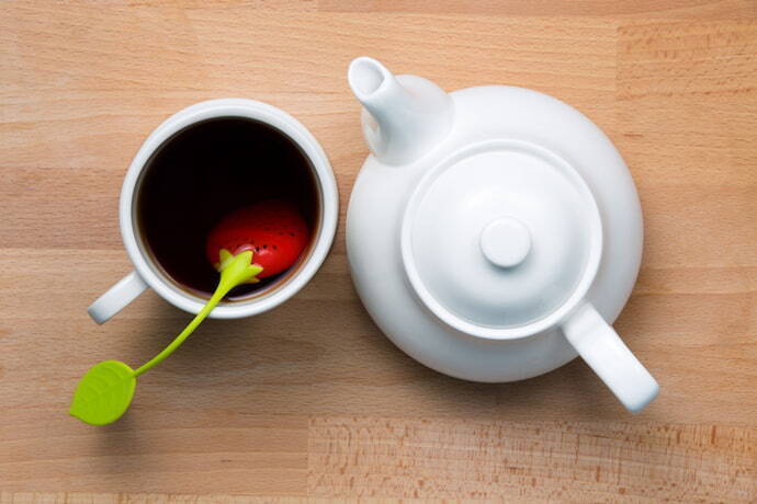 Bule e copo de chá com infusor 