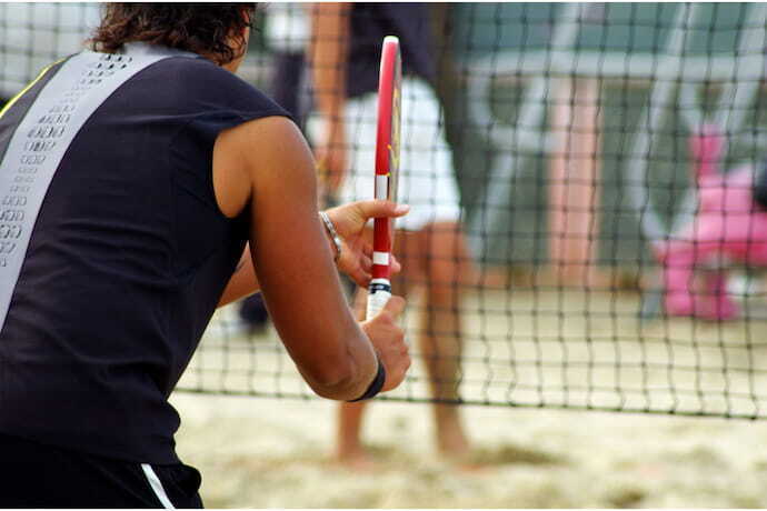 Jogador de beach tennis