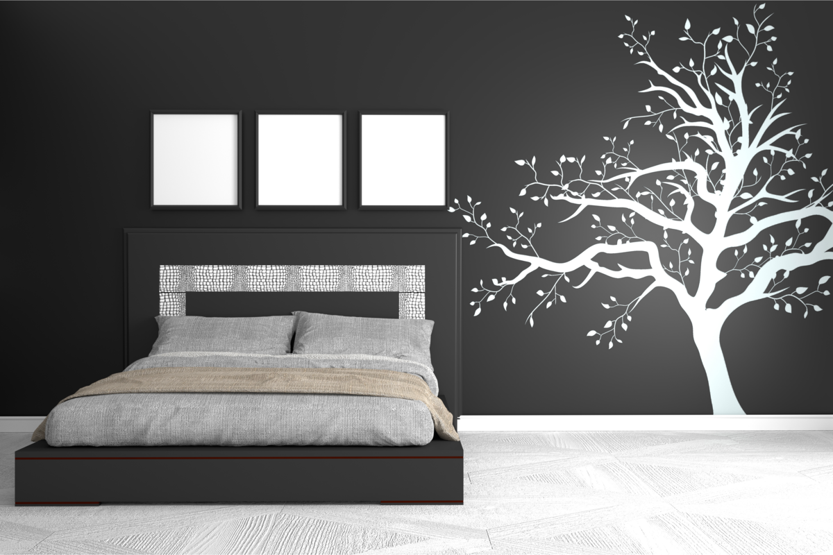 Quarto moderno com parede preta e desenho de árvore.
