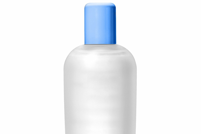 Frasco de shampoo com tampa azul
